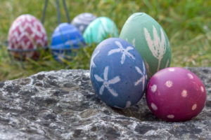 Nest of natural-colored Easter eggs in the garden Nest of natural-colored Easter eggs in the garden